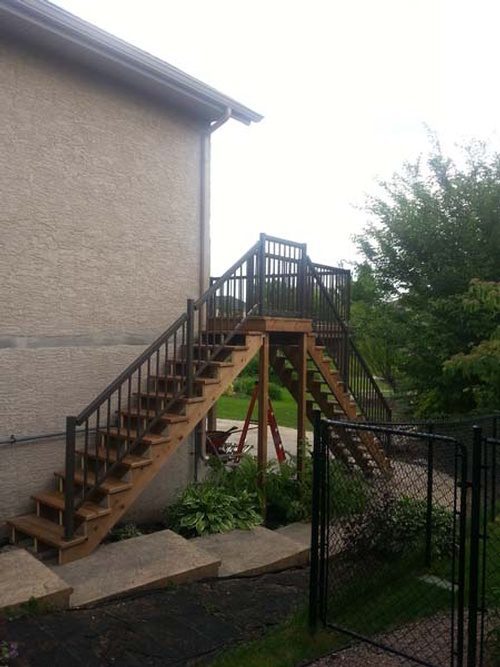 Another view of a second-floor deck and stairs addition