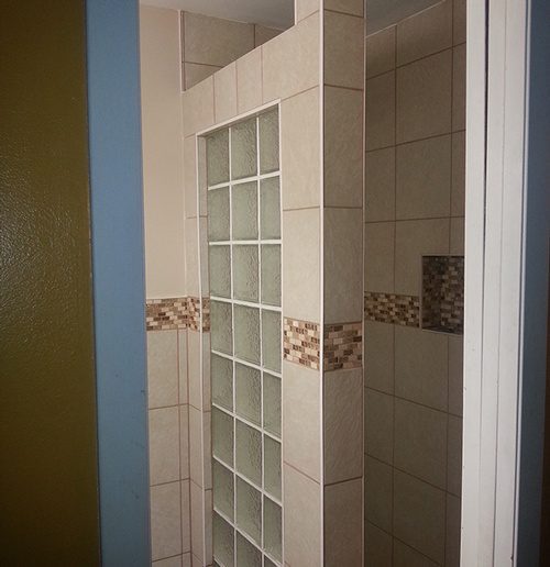 A separator with glass tiles for a bathroom renovation project