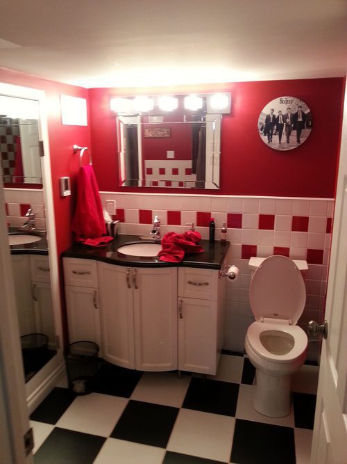 Bathroom sink inside a 50\'s themed bathroom renovation