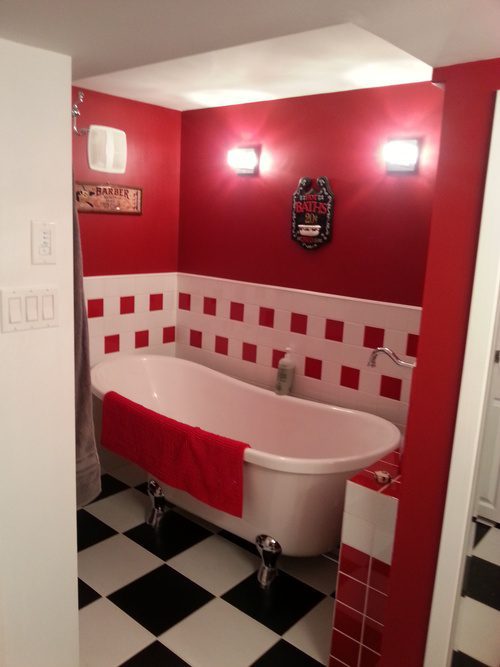 Bathtub inside a 50\'s themed bathroom renovation