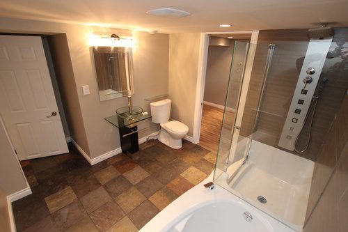 An overlooking view of a bathroom renovation project with two entrances