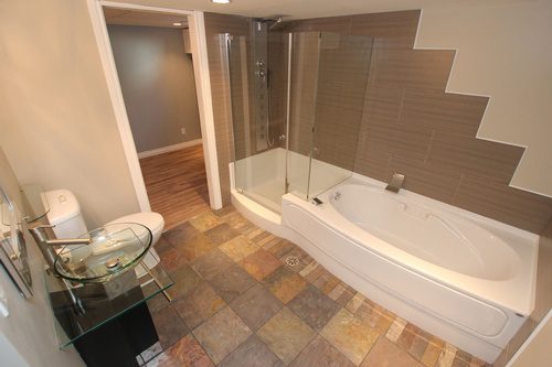 An overlooking view of the bathtub and shower area in a bathroom renovation project