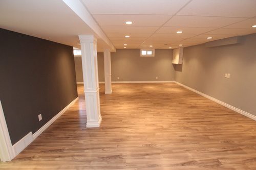 Another view of new floorings and a new layout for a basement renovation project