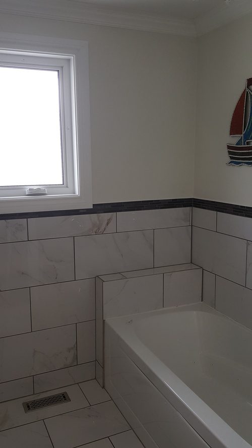 White tiles and white walls for a bathroom renovation