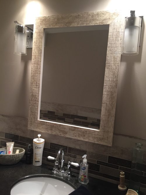 A textured frame for the bathroom mirror