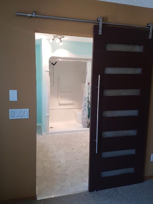 Adding a sliding door for a bathroom renovation project