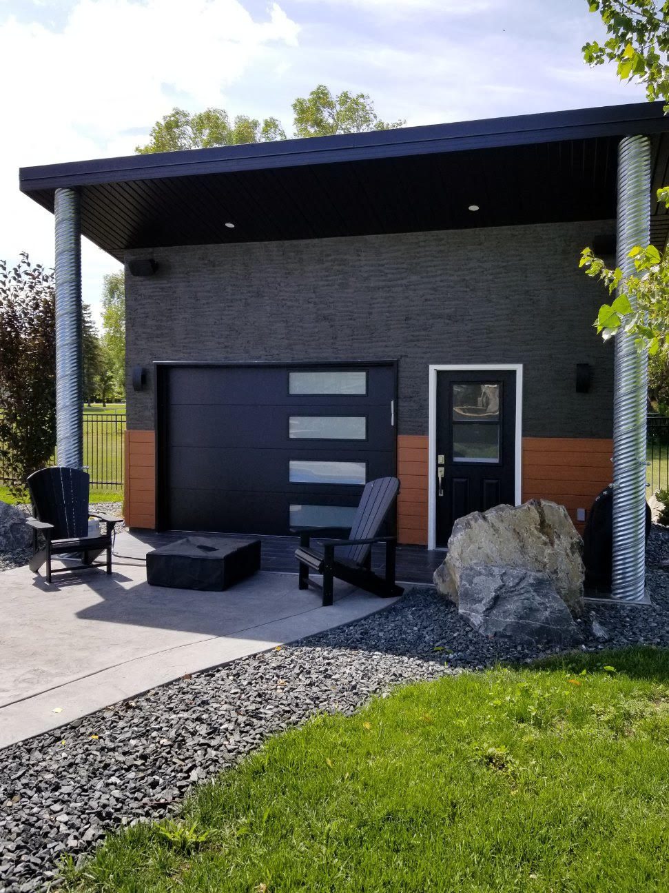 Faux wood and dark stucco outside seating area renovation